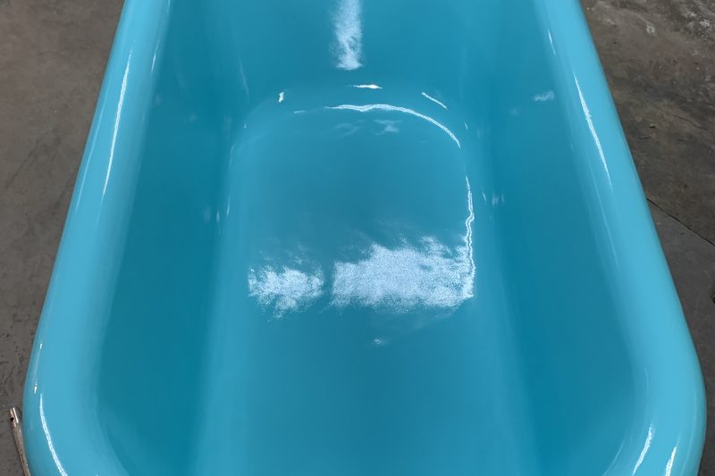 Clawfoot tub refinished in glossy teal by Blackstone Tub Refinishers Calgary